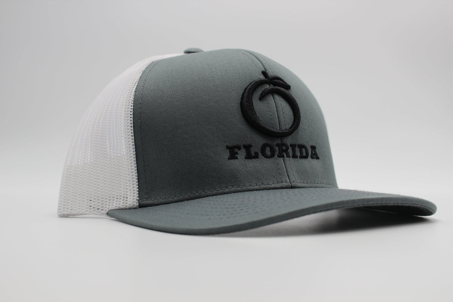 The Ridge Trucker Charcoal/White Black logo
