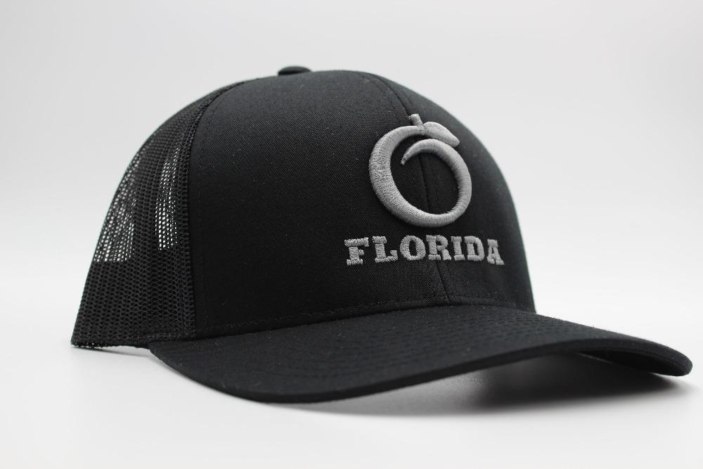 The Ridge Trucker Black/Black Silver logo